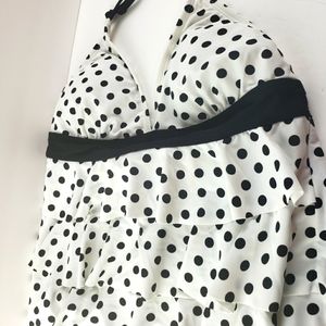 White and black polka dot swimsuit top